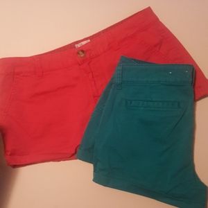 2 pairs of shorts 1 green 1 red